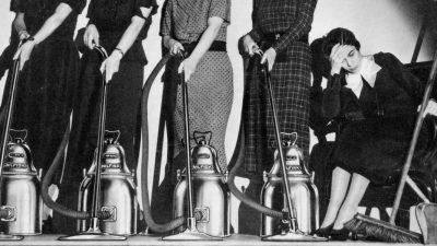 Old advertisement featuring happy housewives with vaccuum cleaners and one sad housewife with dustpan and brush