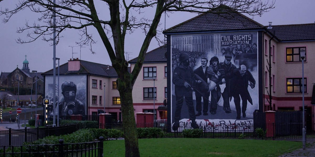 Photograph of a mural on the side of a house depicting Bloody Sunday