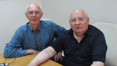 Article author Johnathan Steele (left) sat next to former premier of the Soviet Union Mikhail Gorbachev (right)