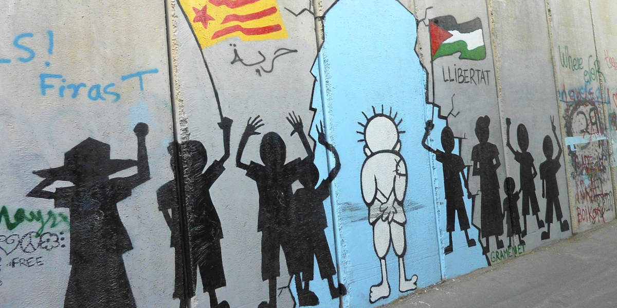 Handala, a character originally drawn by Naji Al-Ali, painted onto the West Bank barrier