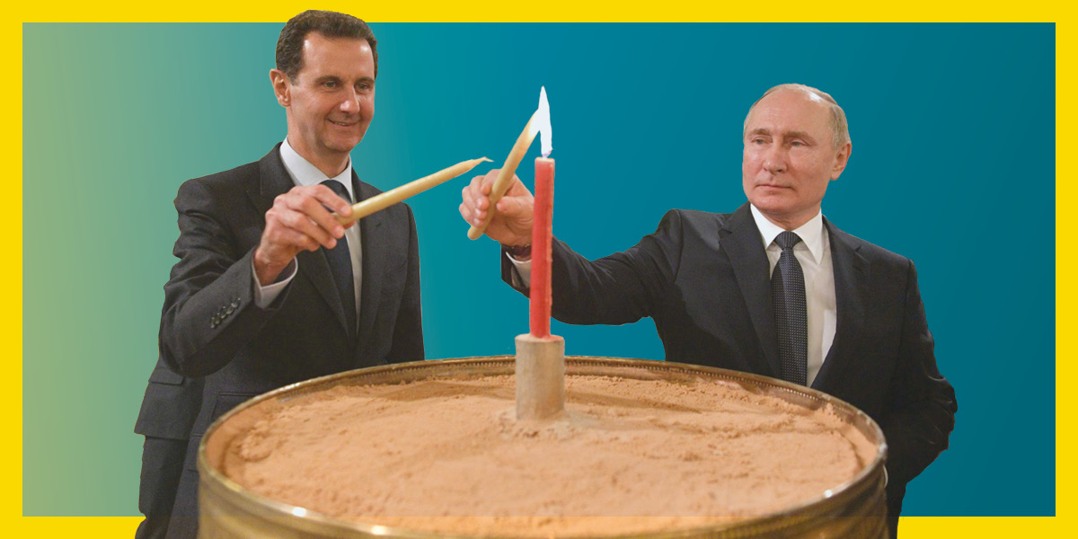 A photo of two men in suit and tie – Vladimir Putin and Bashar al-Assad – together lighting white candles from a red candle that sits in the middle of a round platform