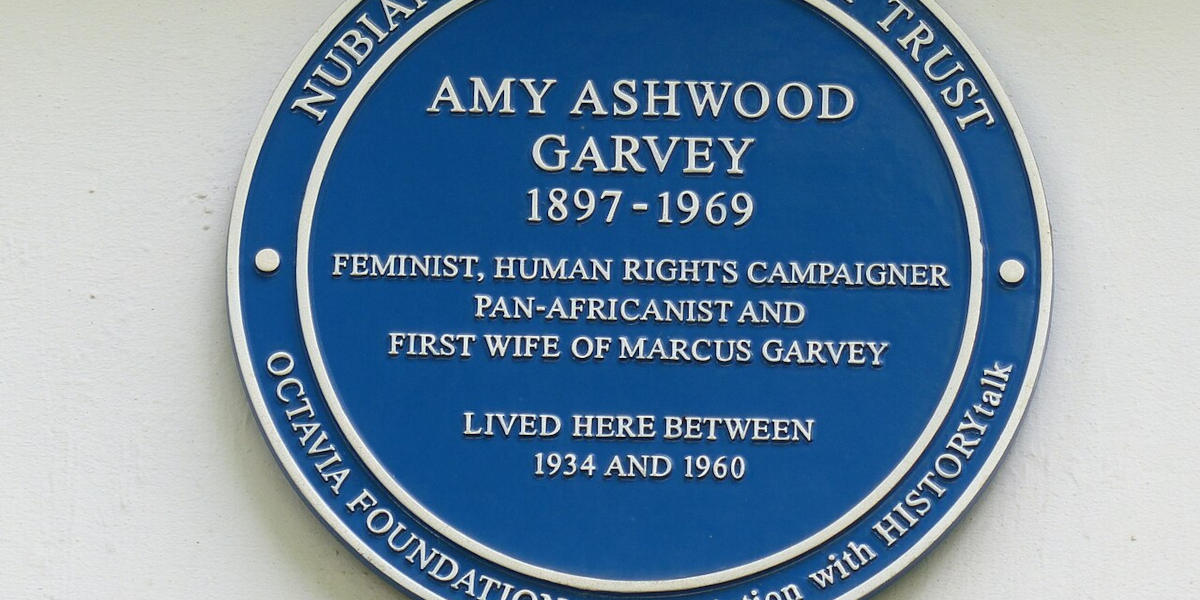 A photograph of a blue blaque reading 'Amy Ashwood Garvey, 1897-1969, Feminist, Human Rights Campaigner, Pan-Africanist and first wife of Marcus Garvey, lived here between 1934 and 1960'